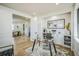 Bright office features modern décor, built-ins, beautiful hardwood floors, and ample natural light at 4176 Zenobia St, Denver, CO 80212