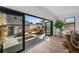 Outdoor patio area with comfortable seating, accessible from the living room at 4176 Zenobia St, Denver, CO 80212