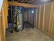 Basement with water heater and exposed utilities at 16835 E Harvard Pl, Aurora, CO 80013