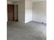 Carpeted bedroom features neutral walls with white baseboard trim at 16835 E Harvard Pl, Aurora, CO 80013