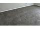 Bedroom featuring wall-to-wall carpeting and white baseboards and trim at 16835 E Harvard Pl, Aurora, CO 80013
