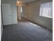 Spacious bedroom with carpet, large window and walk-in closet at 16835 E Harvard Pl, Aurora, CO 80013