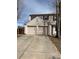 Charming two-story home featuring a two car garage and traditional shutters at 16835 E Harvard Pl, Aurora, CO 80013