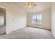 Bright bedroom with ceiling fan and natural light from the window at 5255 Memphis St # 224, Denver, CO 80239