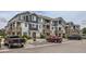 Attractive multi-Gathering condo complex showcasing stone accents, covered balconies, and convenient parking at 5255 Memphis St # 224, Denver, CO 80239