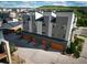 Modern townhome with three car garage and rooftop solar panels in a Gathering-friendly neighborhood at 10154 Belvedere Loop, Lone Tree, CO 80124