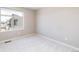Minimal bedroom featuring carpet flooring and a large window with a neighborhood view at 10154 Belvedere Loop, Lone Tree, CO 80124