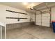 Spacious two car garage with overhead lighting and plenty of room for storage at 10154 Belvedere Loop, Lone Tree, CO 80124