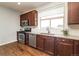 Bright kitchen with modern appliances, granite countertops, and classic cabinetry at 10154 Belvedere Loop, Lone Tree, CO 80124