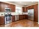 Charming kitchen with stainless steel appliances and sleek cabinets at 10154 Belvedere Loop, Lone Tree, CO 80124