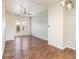 Inviting living room with hardwood floors and natural light from large windows at 10154 Belvedere Loop, Lone Tree, CO 80124