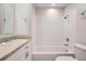This bathroom has a shower-tub combo and a vanity sink with great lighting at 3523 Brushwood Dr, Castle Rock, CO 80109