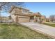 Exterior view of a two-story home with a well-maintained front yard at 3523 Brushwood Dr, Castle Rock, CO 80109
