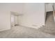 Large living room with neutral carpet and bright, natural light at 3523 Brushwood Dr, Castle Rock, CO 80109