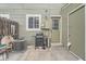 Patio with a grill, seating, and a storage shed, perfect for outdoor entertaining at 14344 E Hawaii Cir # B, Aurora, CO 80012