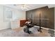 Basement workout room with weight bench and carpet at 625 S Xenon Ct, Lakewood, CO 80228