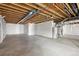Unfinished basement with exposed ceiling, plumbing and utilities at 24437 E Powers Ave, Aurora, CO 80016