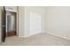 A cozy bedroom with sliding closet doors offers a simple and inviting space at 24437 E Powers Ave, Aurora, CO 80016