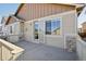 A spacious outdoor deck with access to the home interior, overlooking neighborhood rooftops at 24437 E Powers Ave, Aurora, CO 80016