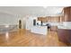 Stylish kitchen with stainless steel appliances and a central island is perfect for entertaining at 24437 E Powers Ave, Aurora, CO 80016
