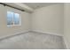 Finished basement featuring neutral walls and carpet at 3310 Quicksilver Rd, Frederick, CO 80516