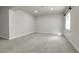 Finished basement featuring neutral walls and carpet at 3310 Quicksilver Rd, Frederick, CO 80516