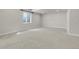 Finished basement featuring neutral walls and carpet at 3310 Quicksilver Rd, Frederick, CO 80516