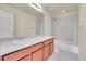 Bathroom featuring a double vanity with neutral countertops at 3310 Quicksilver Rd, Frederick, CO 80516