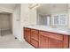 Bathroom with double sink vanity and enclosed shower at 3310 Quicksilver Rd, Frederick, CO 80516
