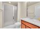 Bathroom featuring a shower and single vanity with neutral countertops at 3310 Quicksilver Rd, Frederick, CO 80516