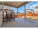 This home features a spacious covered patio, perfect for outdoor dining and relaxation, complemented by a secure fenced yard at 3310 Quicksilver Rd, Frederick, CO 80516