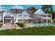 Beautiful home with a pool, manicured yard, and comfortable lounge chairs at 4935 E Preserve Ln, Greenwood Village, CO 80121