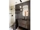 Modern bathroom showcasing a glass-enclosed shower, sleek black hardware, and floating vanity at 4935 E Preserve Ln, Greenwood Village, CO 80121