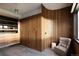 Walk-in closet with custom wood built-ins, drawers, and ample storage space at 4935 E Preserve Ln, Greenwood Village, CO 80121