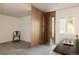 Open entryway with wood paneling, modern lighting, and a view into the home office at 4935 E Preserve Ln, Greenwood Village, CO 80121