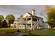 Spacious two-story home with covered patio and outdoor access via exterior staircase at 4935 E Preserve Ln, Greenwood Village, CO 80121