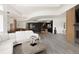 Open-concept living space featuring a modern kitchen, dining area, and comfortable lounge with stylish decor at 4935 E Preserve Ln, Greenwood Village, CO 80121
