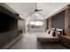 Main bedroom with fireplace and vaulted ceiling at 4935 E Preserve Ln, Greenwood Village, CO 80121