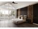 Main bedroom with vaulted ceiling, patio access, and modern decor at 4935 E Preserve Ln, Greenwood Village, CO 80121