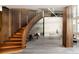 Modern staircase featuring wood slats and high ceilings at 4935 E Preserve Ln, Greenwood Village, CO 80121