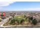Wide aerial shot showcasing the neighborhood with a nearby green park and community at 12742 Vrain St, Broomfield, CO 80020