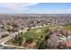 Aerial view of the neighborhood, highlighting a green park and residential streets at 12742 Vrain St, Broomfield, CO 80020