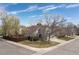 Beautiful exterior of a two-story home with a well-manicured front lawn and mature trees at 12742 Vrain St, Broomfield, CO 80020