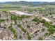Scenic aerial view of a residential area near shopping centers and green spaces at 9692 W Coco Cir # 304, Littleton, CO 80128