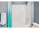 Clean bathroom showcasing a bathtub and shower, providing a refreshing and functional space at 9692 W Coco Cir # 304, Littleton, CO 80128