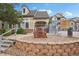 Charming community clubhouse with stone accents and well-maintained landscaping at 9692 W Coco Cir # 304, Littleton, CO 80128