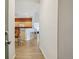 Inviting kitchen with breakfast bar and view into the living space at 9692 W Coco Cir # 304, Littleton, CO 80128