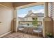 Balcony offers a cozy outdoor space with views of surrounding buildings and sky at 9692 W Coco Cir # 304, Littleton, CO 80128