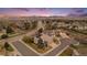Beautiful aerial view of a house in a peaceful neighborhood, showcasing its prime location and picturesque surroundings at 15907 W 72Nd Dr, Arvada, CO 80007