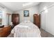 Cozy bedroom with natural light, dresser, and ample closet space creating a relaxing atmosphere at 17467 E Rice Cir # C, Aurora, CO 80015